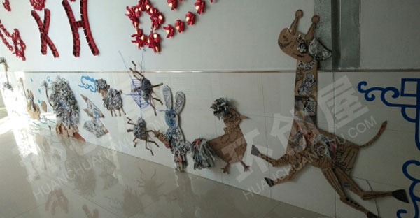 幼儿园走廊墙面报纸碎片创意动物环创图片