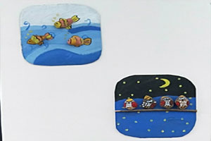 幼儿园小小石头画墙面作品展示图片