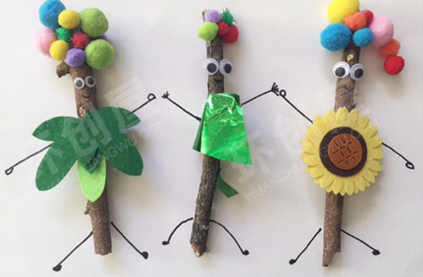 幼儿园美工区树枝卡纸绳子小人环创图片