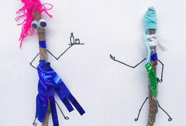 幼儿园美工区树枝卡纸绳子小人环创图片