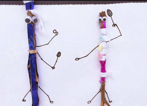 幼儿园美工区树枝卡纸绳子小人环创图片