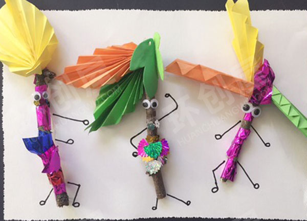 幼儿园美工区树枝卡纸绳子小人环创图片