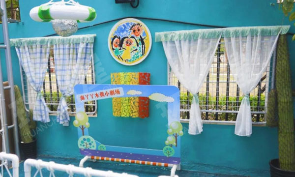 幼儿园户外长颈鹿植物园里的角色游戏环创图片