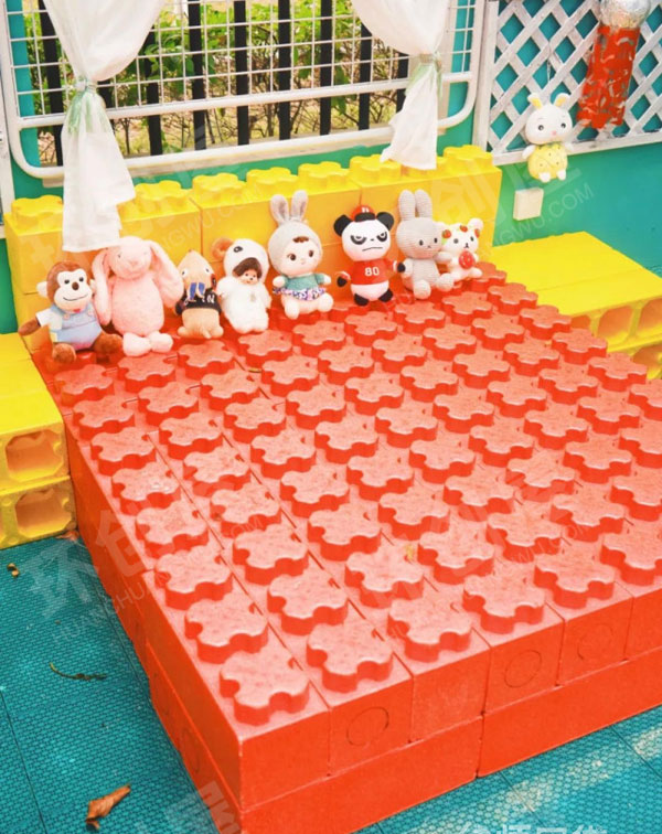 幼儿园户外长颈鹿植物园里的角色游戏环创图片