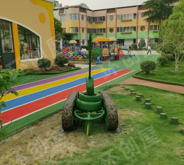 幼儿园户外超高级轮胎造型环创图片
